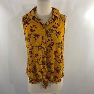 A yellow blouse w/ flowers, size M, no boundaries